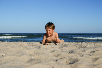 child playing on the ocean seashore