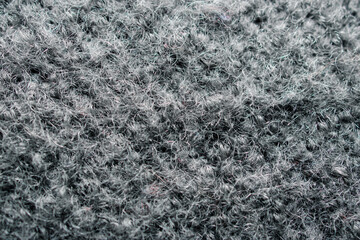 close-up of a rough blanket in gray