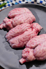 mutton brain on a chopping board 