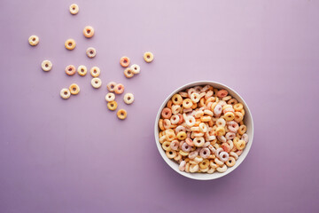 Fototapeta na wymiar top view of colorful cereal corn flakes in a bowl 