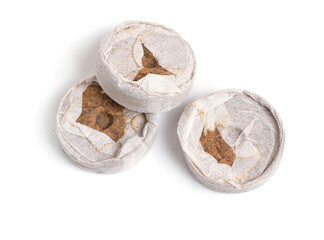 Peat tablets or briquettes for sprouts. Isolated on white background
