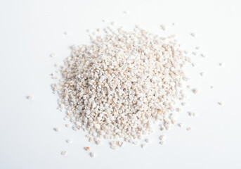 Heep of Expanded perlite on white background