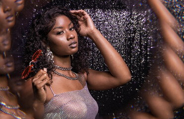euphoria inspired editorial photo shoot glitter background purple black model african america...