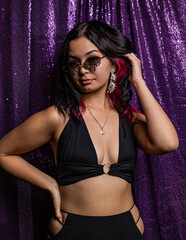 euphoria inspired editorial photo shoot glitter background purple black model caucasian hispanic...