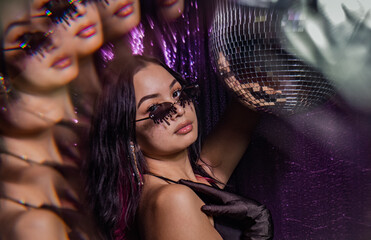 euphoria inspired editorial photo shoot glitter background purple black model caucasian hispanic model fashion photo shoot party dance disco queen ball glasses hairstyle 90s 20s hbo - obrazy, fototapety, plakaty