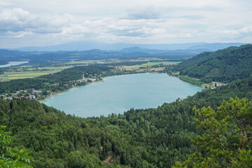 Fototapeta na wymiar View of Lake Klopein from the mountains on a cloudy day, carinthia, austria