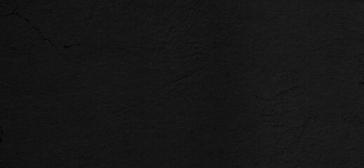 Asphalt texture - top view and close-up of a fragment of an old asphalt road