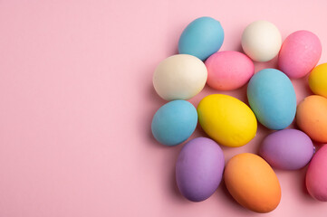 Bright Easter Eggs on Pink Background