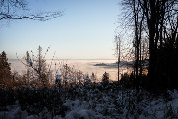 sunset over a foggy valley