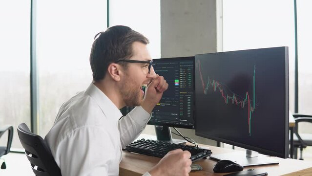 Trader celebrating successful day at the stock market. Bitcoin growth, bullrun