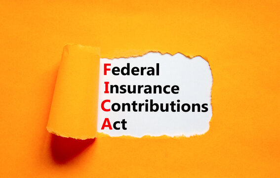 FICA symbol. Concept words FICA federal insurance contributions act on white paper on beautiful orange background. Business FICA federal insurance contributions act concept. Copy space.