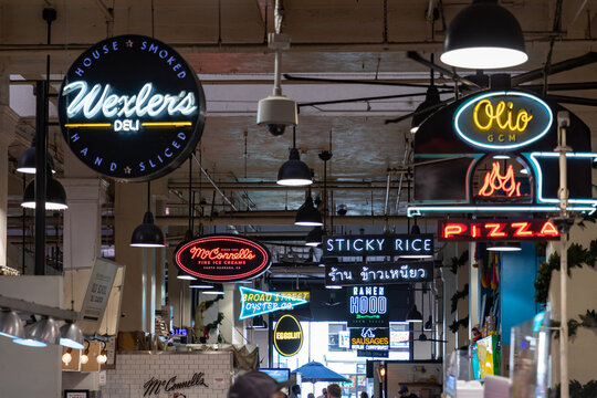 Los Angeles, United States - November 18, 2022: A picture of the neon signs inside the Grand Central Market.