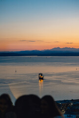 View over Seattle harbour area during dusk sunset on summer day in august evening with both...