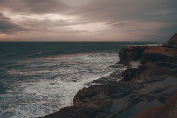 Standing on cliff overlooking looking the ocean on a cloudy day - Pacific Ocean - San Diego Cliffs
