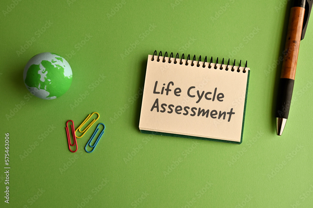 Poster there is a notebook with the word lca. it is eye-catching image.