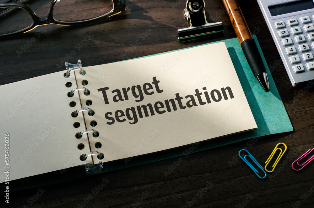 Poster there is a notebook with the word target segmentation. it is an eye-catching image.