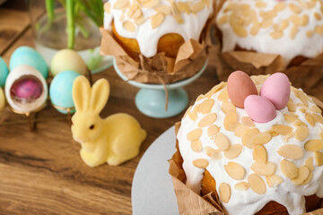 Easter cakes and painted eggs on kitchen counter