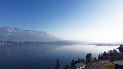View over a lake. Blue sky and mountain.