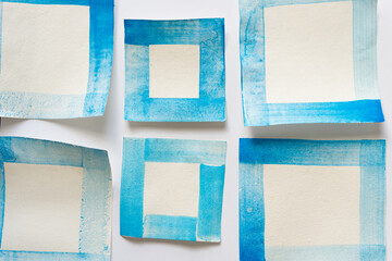 six paper frame objects on blank paper