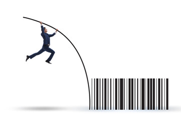 Businessman jumping over bar code in pole vaulting - Powered by Adobe