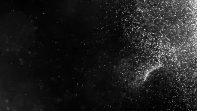 Shot of real dust particles floating in the air. Dust Particles Background. Macro slow motion shot, Use blending mode (screen)