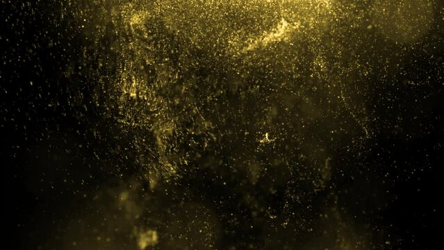 Gold ink in water shooting with high speed camera. Gold glitter background with sparkle shine light confetti. Super Slow Motion at 1000fps. effect. blue glitter