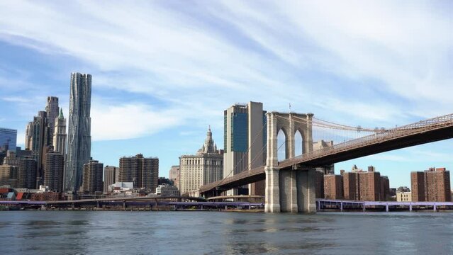 Brooklyn Bridge with Manhattan skyline in background in New York City