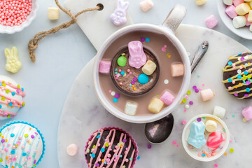 A look into a mug of hot cocoa with a hot chocolate bomb floating.