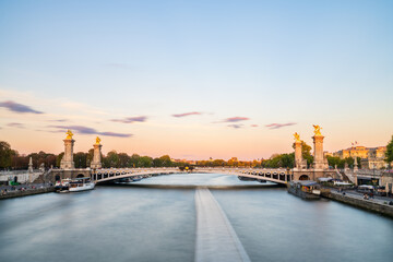 Fototapeta na wymiar Pont Alexandre III bridge at sunset in Paris. France