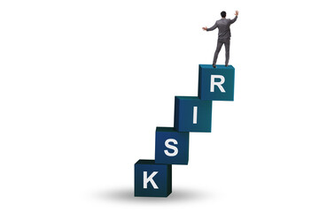 Risk management concept with businessman on cubes