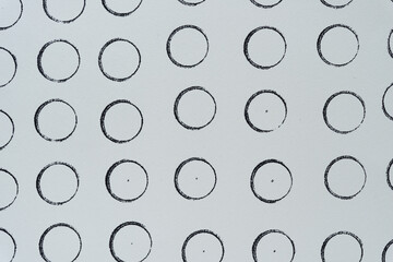 array of ink stamp circles on paper