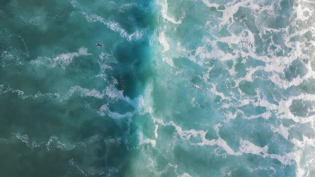 blue waves crashing splash from the top drone aerial above view lacanau ocean gironde nouvelle aquitaine France surf spot relaxing mood protect the sea water video footage 4k tranquil summertime feel