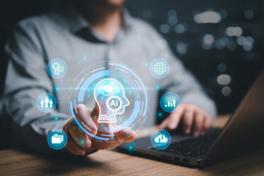 Artificial Intelligence concept. Man using technology smart robot AI for work development and management Artificial intelligence helps to find information to help work efficiently