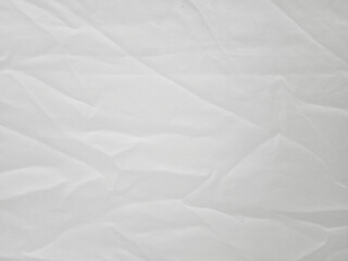 Soft white wrinkled fabric background
