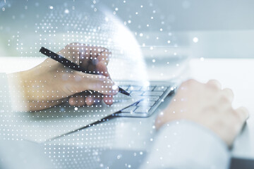 Multi exposure of abstract graphic world map and hand writing in diary on background with laptop,...