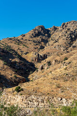 Fototapeta na wymiar Mountain ridges in the cliffs and skies or arizona great outdoors in wild west of american in sonora desert ridges