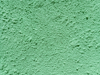 Green wall texture. Green concrete wall. Green concrete texture. Green wall texture background. Green plaster wall texture background.