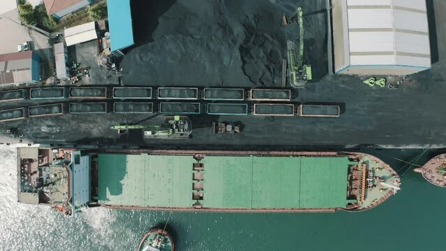 Electric locomotive with freight cars or railway wagon rides on railroad in Zonguldak.