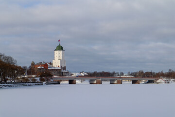 old medieval castle in Vyborg, Russia with the white tower, winter view
