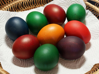Obraz na płótnie Canvas Colored Easter eggs with natural dye, traditional Christian Easter concept