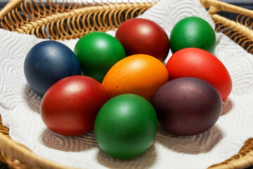 Fototapeta na wymiar Colored Easter eggs with natural dye, traditional Christian Easter concept