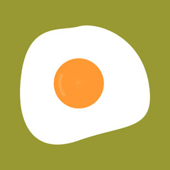 a fried egg with a perfectly round yolk isolated on green
