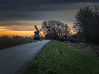 dutch windmill and sunset