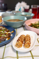 a dining table with different food served in a cafe or restaurant