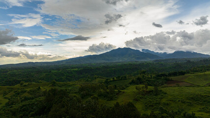 Fototapeta na wymiar Mountain landscape with mountain peaks covered with forest. Negros, Philippines