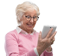 Happy surprised senior lady using a digital tablet - obrazy, fototapety, plakaty