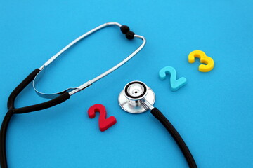 On a blue background lies a stethoscope and the inscription 2023.