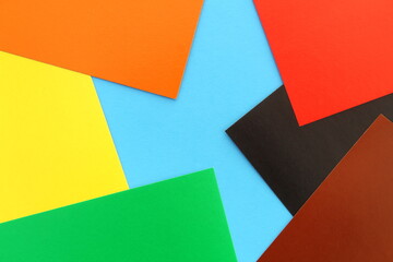 Bright abstract background from multi-colored paper cardboard.