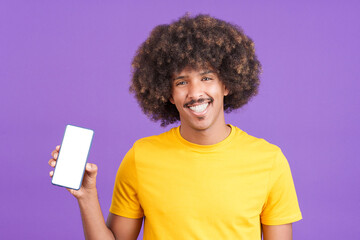 Happy african man holding a mobile with a blank screen