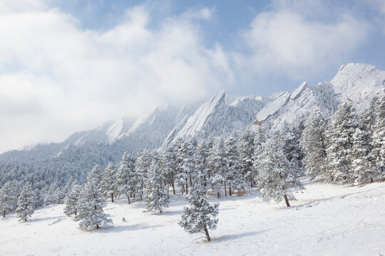 The Flatirons in snow, Chautauqua Park, Boulder, Colorado.